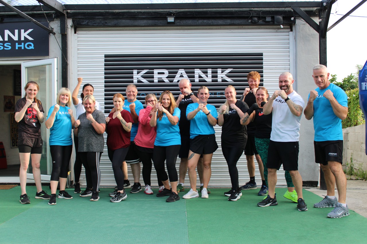 Beginner boxing group class at Krank Boxing & Fitness HQ Durham with members practising punches together