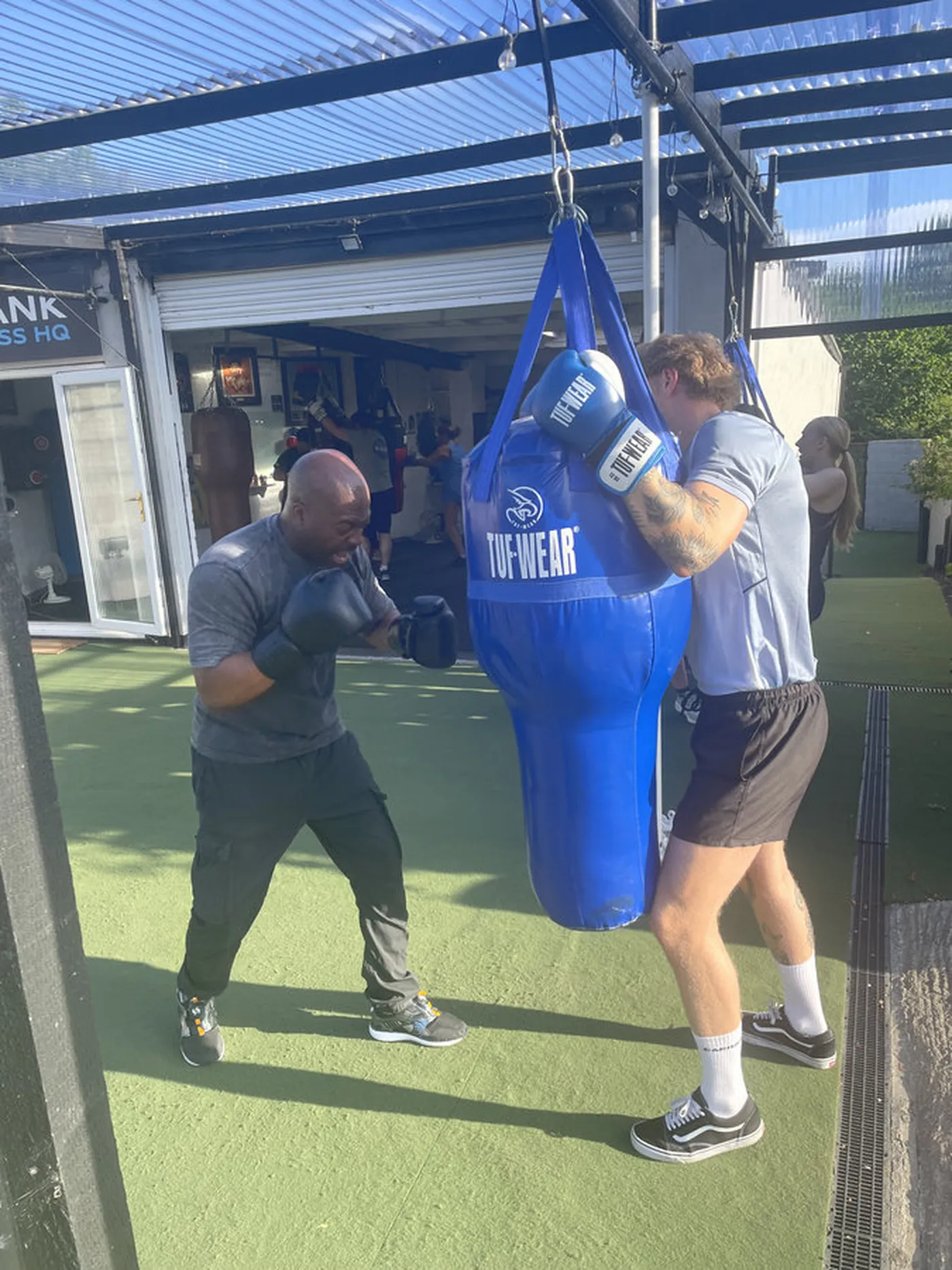 Members taking part in group boxing training at Krank