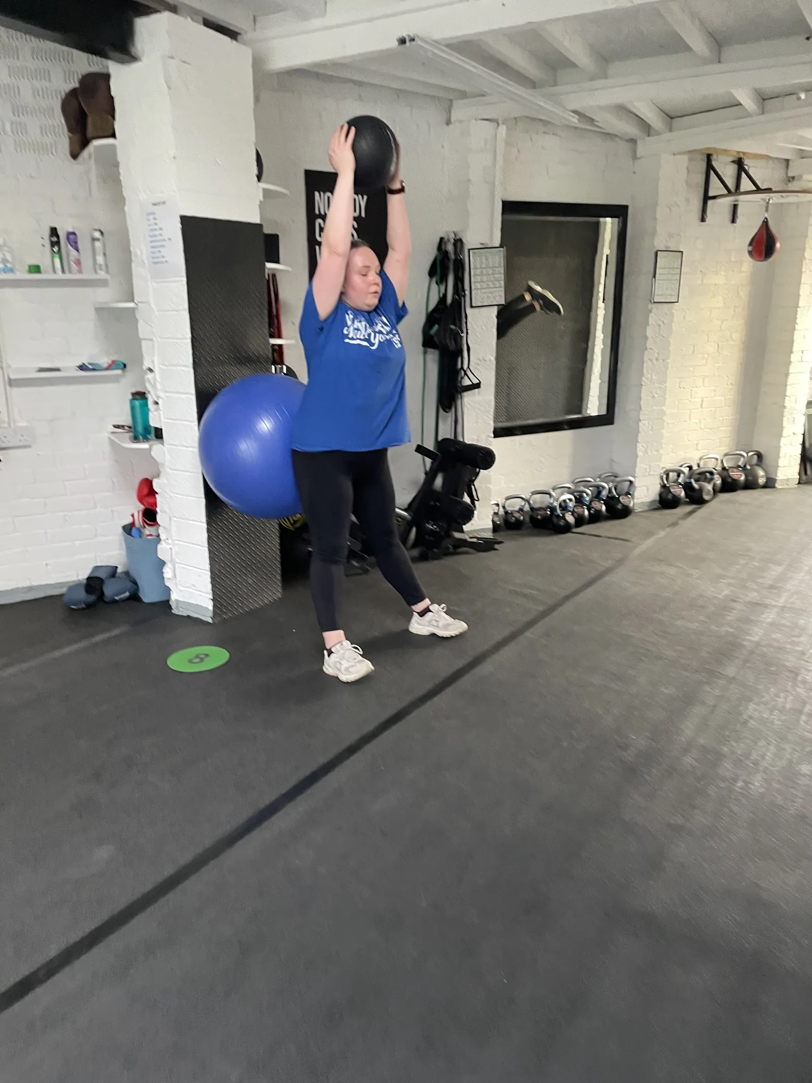 Meg completing balance and conditioning training during a personal training session at Krank Durham